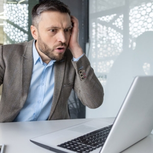 Shocked man at computer